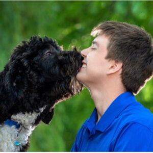 Headshot of Nic Draves with his dog