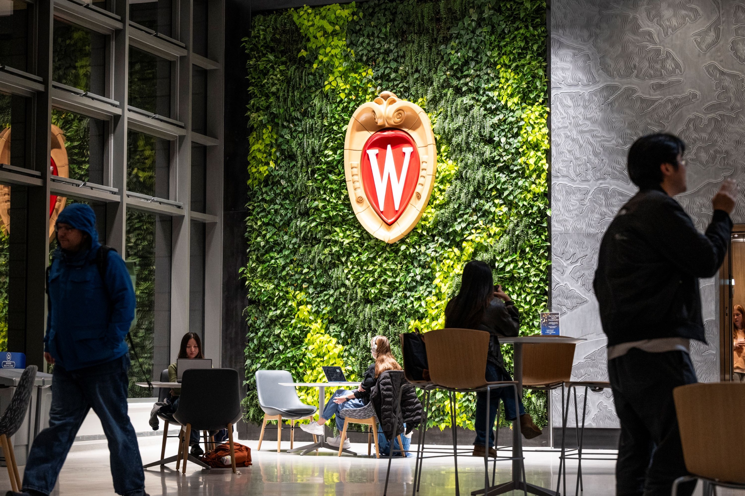 Student study on the first floor of Morgridge Hall at night