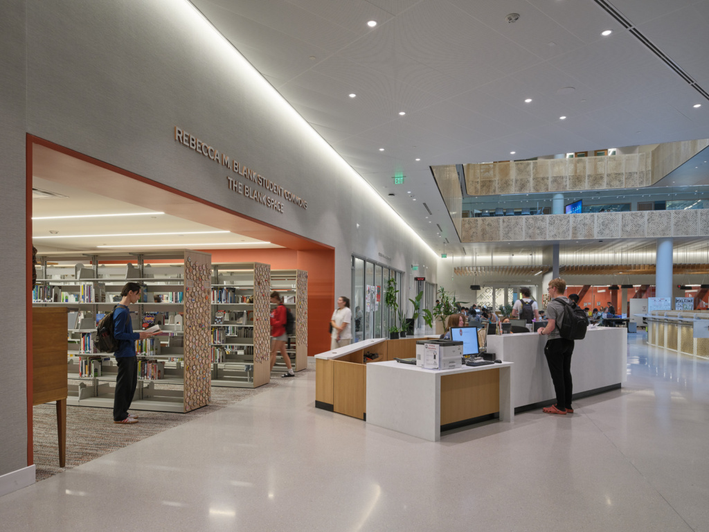 Library desk in large open academic building