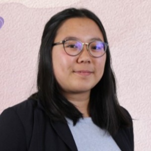Woman by pink background